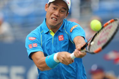 Professional tennis player Kei Nishikori of Japan in action during first round match at US Open 2015
