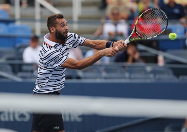 Professional tennis player Benoit Paire of France in action during first round match at US Open 2015