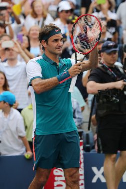 Seventeen times Grand Slam champion Roger Federer of Switzerland celebrates victory after first round US Open 2015