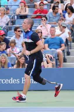Ryan McIntosh, the US soldier veteran and amputee, who serves as a US Open ballboy during  US Open 2015 clipart