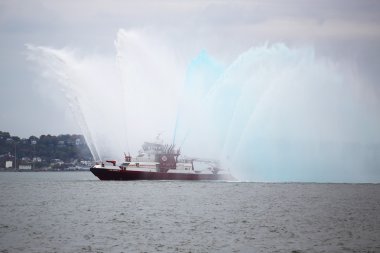 FDNY fire boat sprays water into the air to celebrate the start of New York City Marathon 2015
