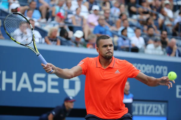 Professional tennis player Jo-Wilfried Tsonga of France in action during his quarterfinal match at US Open 2015 — 图库照片