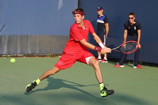 Professional tennis player Jared Donaldson of United States in action during his first round match at US Open 2015 — Stok fotoğraf