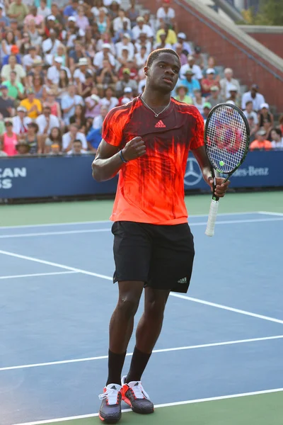 Professional tennis player Frances Tiafoe of United States in action during his first round match at US Open 2015 — Stok fotoğraf
