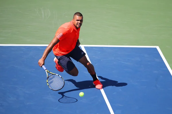 Professional tennis player Jo-Wilfried Tsonga of France in action during his round four match at US Open 2015 — ストック写真