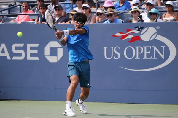 Professional tennis player Hyeon Chung of Korea in action during his second round match at US Open 201 — ストック写真