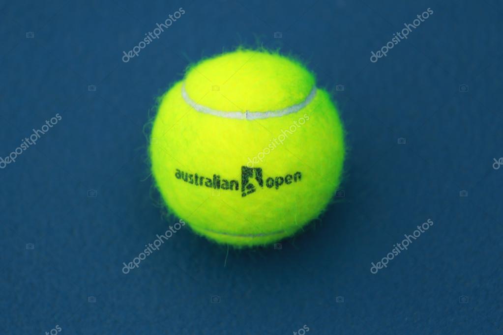 MELBOURNE, AUSTRALIA - JANUARY 27, 2016: Wilson tennis ball with Australian Open logo on tennis court at Australian tennis center in Melbourne