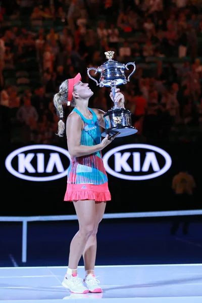 Grand Slam champion Angelique Kerber of Germany holding Australian Open trophy during trophy presentation after victory at Australian Open 2016 — Stockfoto
