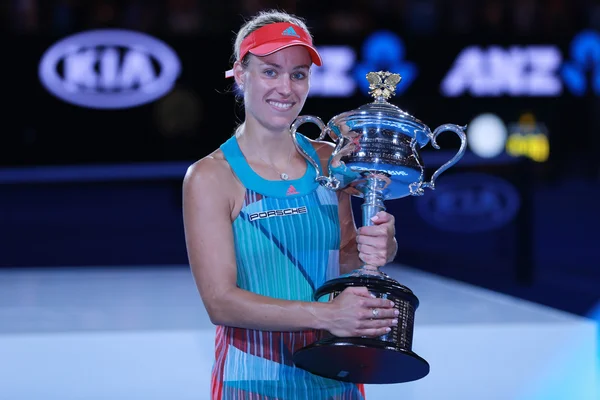 Grand Slam champion Angelique Kerber of Germany holding Australian Open trophy during trophy presentation after victory at Australian Open 2016 — стокове фото