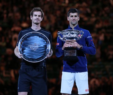 Australian Open 2016 finalist Andy Murray (L) and Grand Slam champion Novak Djokovic of Serbia during trophy presentation
