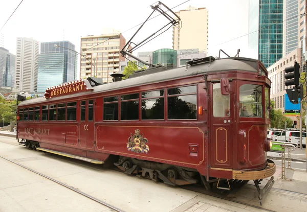 Tram restaurant runs through Burke Street in Melbourne — ストック写真