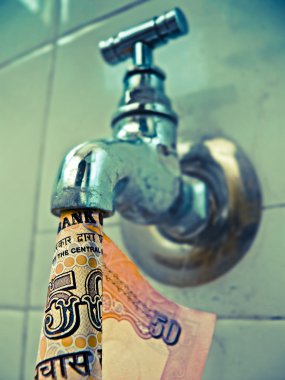 water tap with fifty rupees Indian banknote, Concept clipart