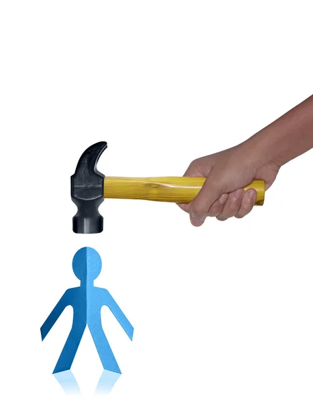 Hammer hitting a Paper Man — Stock Photo, Image