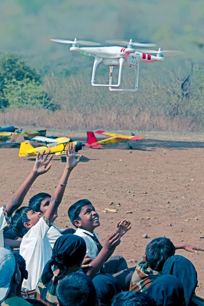 Drone helicopter flying near student — Stock Photo, Image