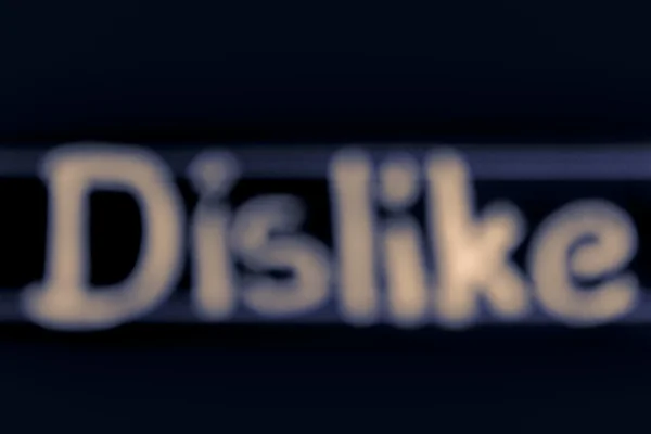 Imagen borrosa de la palabra disgusta escrita a mano en pizarra negra — Foto de Stock