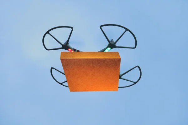 Air drone carrying carton box for fast delivery concept — Stock Photo, Image