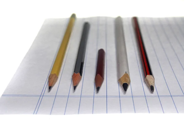 Pencils on paper — Stock Photo, Image