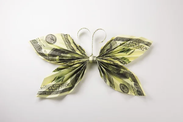 Dolarů v podobě motýlů — Stock fotografie
