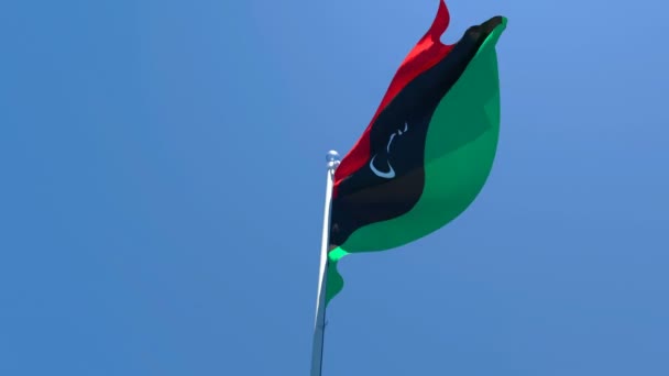 Libyens nationella flagga fladdrar i vinden — Stockvideo