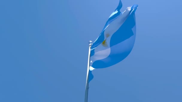 La bandera nacional de Argentina ondea en el viento contra un cielo azul — Vídeos de Stock