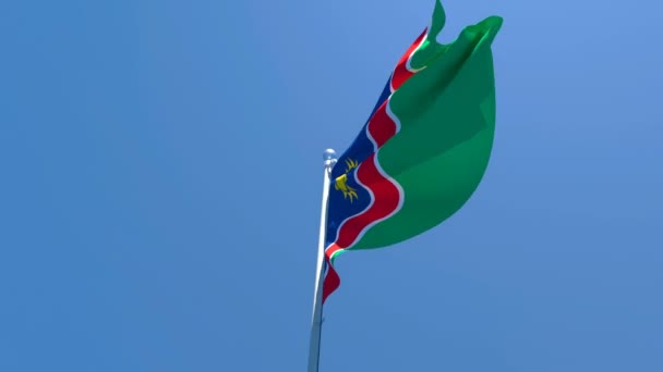 Державний прапор Намібії пурхає з вітром. — стокове відео