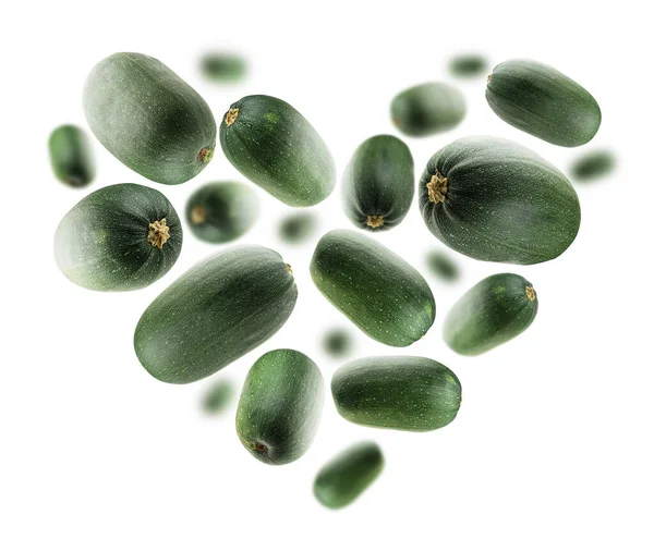 Green zucchini in the shape of a heart on a white background — Stock Photo, Image