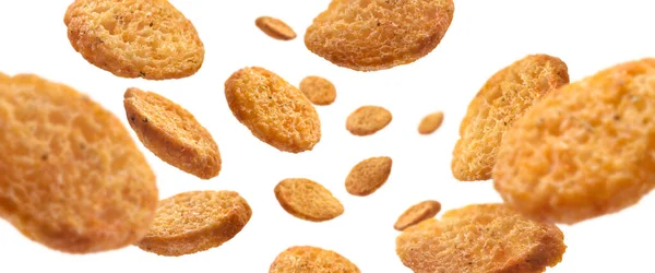 Bread croutons levitate on a white background — Stock Photo, Image