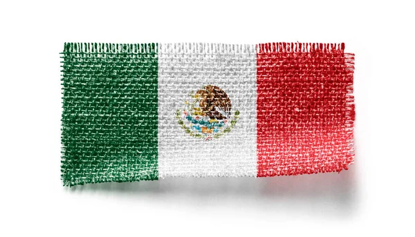 Messico bandiera su un pezzo di stoffa su sfondo bianco — Foto Stock