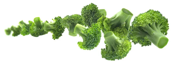 Green broccoli levitating on a white background — Stock Photo, Image