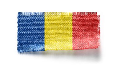 Romanya beyaz arka planda bir kumaş parçasına bayrak dikti