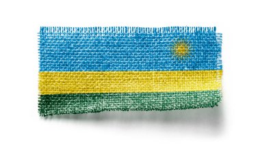 Ruanda bayrağı beyaz arka planda bir parça kumaş üzerinde