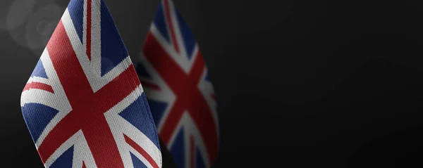 Small national flags of the United Kingdom on a dark background — Stock Photo, Image