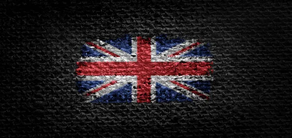Bandera nacional del Reino Unido sobre tela oscura —  Fotos de Stock