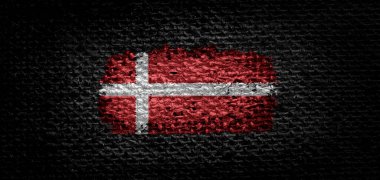 Danimarka 'nın ulusal bayrağı koyu renk kumaşta