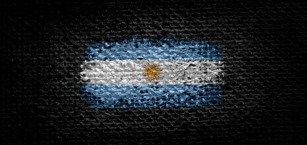 Nationale vlag van Argentinië op donkere stof — Stockfoto