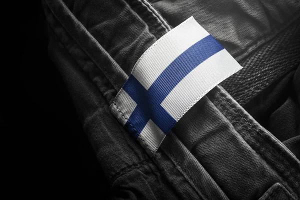 핀란드 국기의 형태로 짙은 색의 옷을 입는다 — 스톡 사진