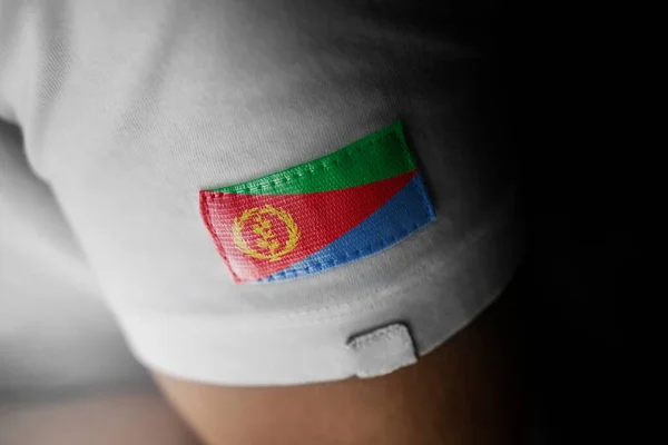 Patch av Eritreas nationella flagga på en vit t-shirt — Stockfoto