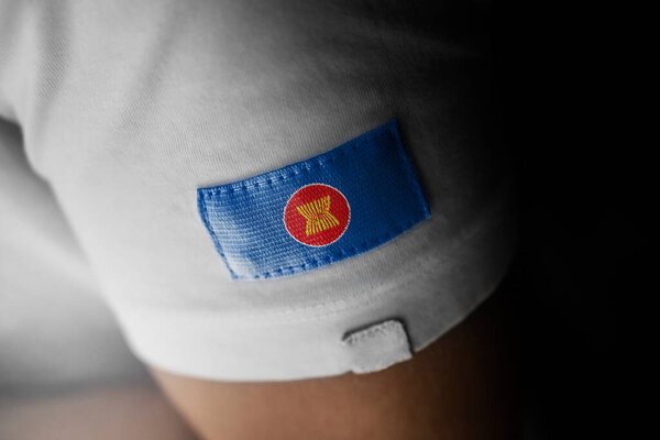 Patch of the national flag of the ASEAN on a white t-shirt