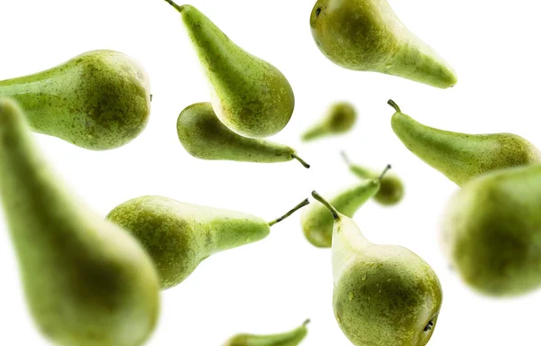 Green pears levitate on a white background — Stock Photo, Image