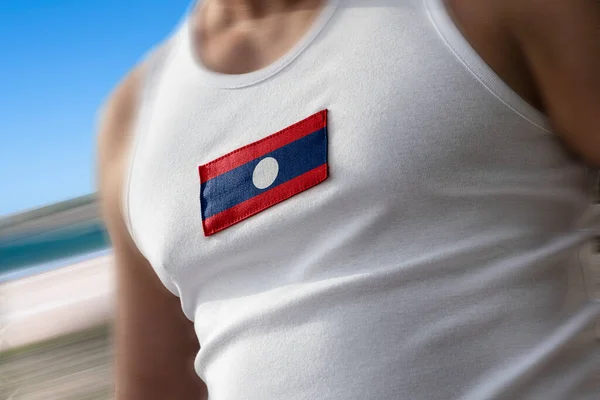 Laoská národní vlajka na truhlici sportovců — Stock fotografie