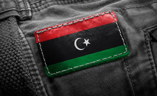 На темному одязі у формі прапора Лівії. — стокове фото