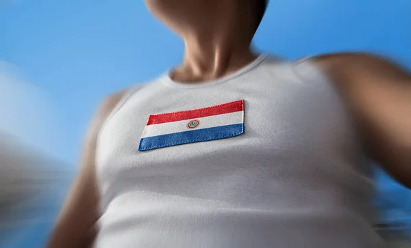 The national flag of Paraguay on the athletes chest — Stock Photo, Image