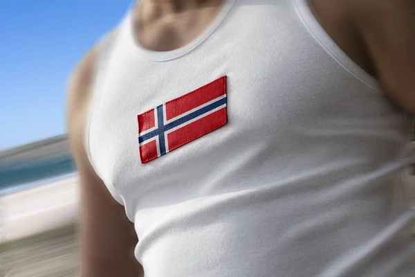 Nationell flagga Norge på idrottare bröstet — Stockfoto
