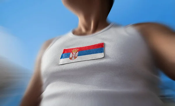 Державний прапор Сербії на грудях. — стокове фото