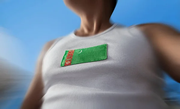 The national flag of Turkmenistan on the athletes chest — Stock Photo, Image