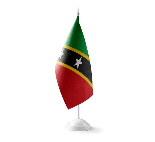 Piccola bandiera nazionale dei Saint Kitts e Nevis su sfondo bianco — Foto Stock