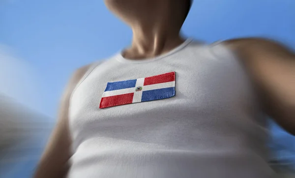 Flaga Dominikany na klatce piersiowej sportowców — Zdjęcie stockowe