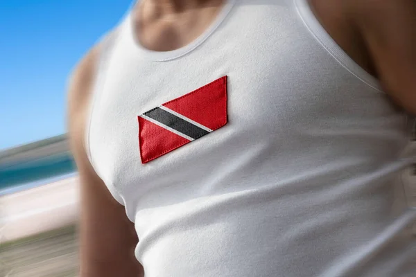 選手の胸にトリニダード・トバゴの国旗 — ストック写真