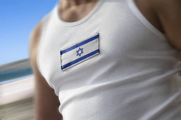 La bandera nacional de Israel en el pecho de los atletas — Foto de Stock