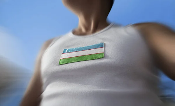 The national flag of Uzbekistan on the athletes chest — Stock Photo, Image